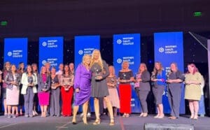 Sherrie Cowley accepting an award